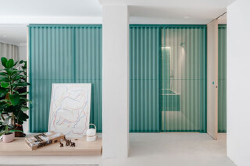 A Perforated Metal Box Hides the Bathroom in This Small Madrid Apartment