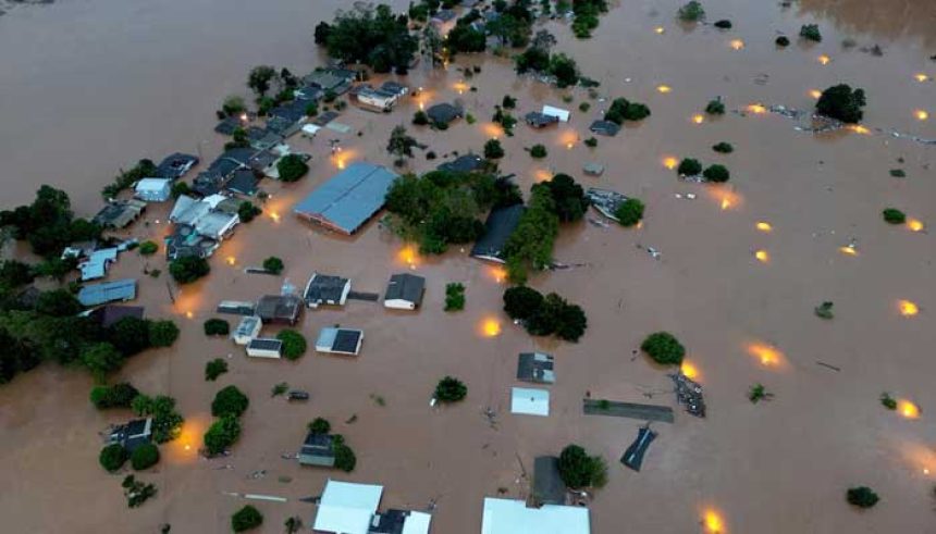 A drone view shows houses in the flooded area next to the Taquari River during heavy rains in the city of Encantado in Rio Grande do Sul, Brazil, May 1, 2024. — Reuters