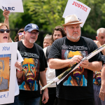 Family members of Marc Fogel at a rally outside the White House