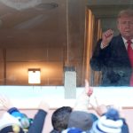 Trump saluting fans