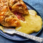 Baked Brie in Puff Pastry With Red Onion Jam Is a New Holiday Must-Have