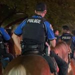 Mounted police patrolling down Rainey Street