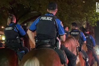 Mounted police patrolling down Rainey Street