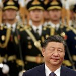 Xi Jinping in front of Chinese soldiers