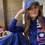 Chrissy Teigen wears rival London team’s shirt at Arsenal v Ipswich Town