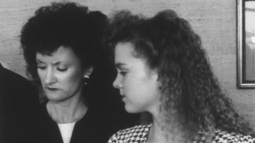 Wanda Holloway, left, and her daughter Shanna Harper, right leave the courtroom