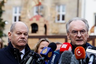 German Chancellor Olaf Scholz looks on as Prime Minister of Saxony-Anhalt Reiner Haseloff speaks to the media during a visit to the site where a car drove into a crowd of a Christmas market in Magdeburg, Germany December 21, 2024. — Reuters