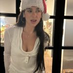 Dua Lipa's plunging Santa 'fit was so festive.