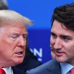 Donald Trump (L) talks with Canada's Prime Minister Justin Trudeau