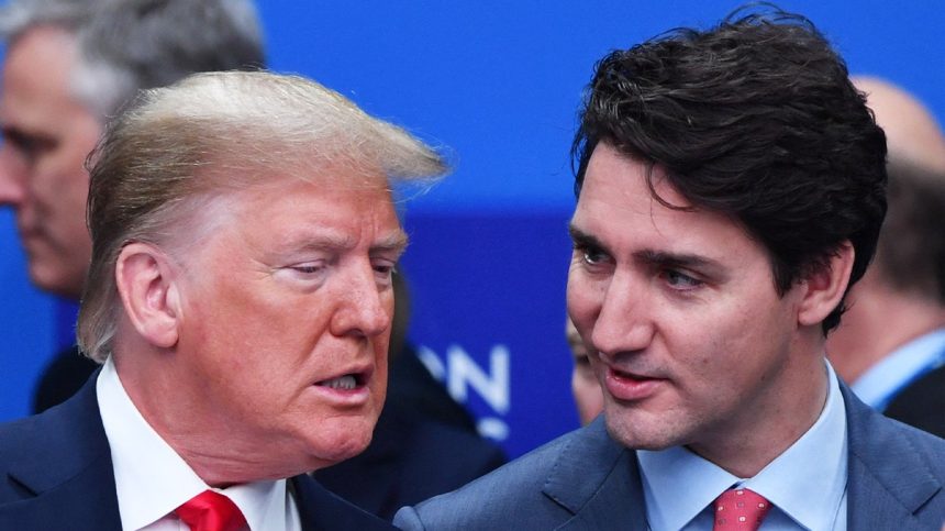 Donald Trump (L) talks with Canada's Prime Minister Justin Trudeau