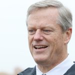 Charlie Baker outside a polling location