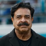 Shad Khan on the field