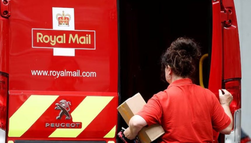 A postal worker makes a delivery in London, Britain, July 21, 2022. — Reuters