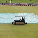 A groundsman drives a Super Sopper on the outfield next to the covered pitch as rain delays the start of play on the third day of the first cricket Test match between South Africa and Pakistan at SuperSport Park in Centurion on December 28, 2024. —AFP