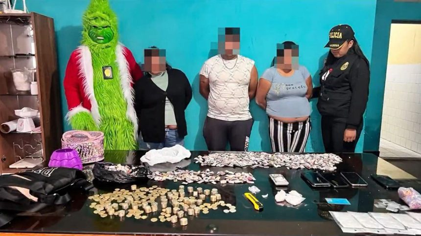 The Grinch posing with suspected drug traffickers.