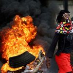 A protester reacts near a burning barricade during a national shutdown against the election outcome, at Luis Cabral township in Maputo, Mozambique, November 7, 2024. — Reuters