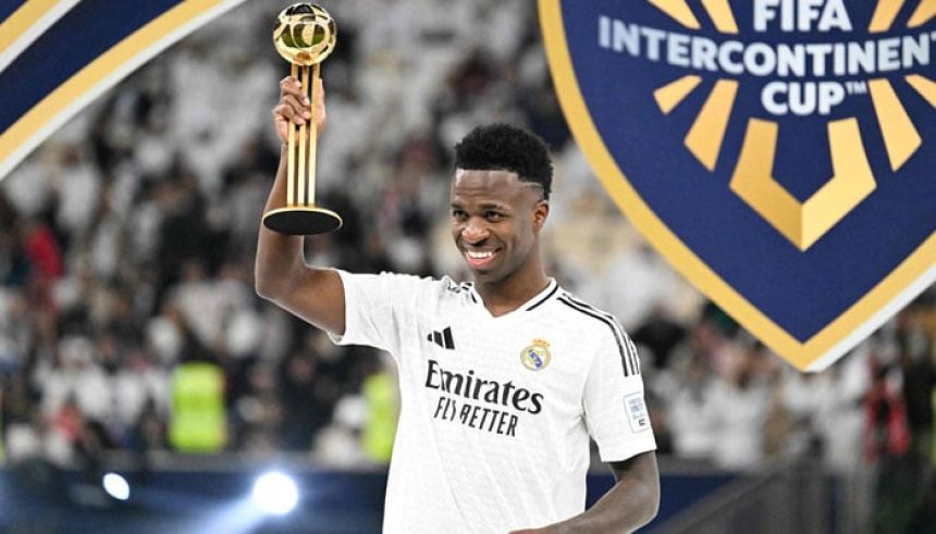 Real Madrids Brazilian forward #7 Vinicius Junior poses with his gold ball award during the podium ceremony after the 2024 FIFA Intercontinental Cup final football match between Spains Real Madrid and Mexicos Pachuca at the Lusail Stadium in Doha on December 18, 2024. — AFP