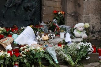 Floral tributes are left by a church near the site where a car drove into a crowd at a Magdeburg Christmas market in Magdeburg, Germany December 21, 2024. — Reuters