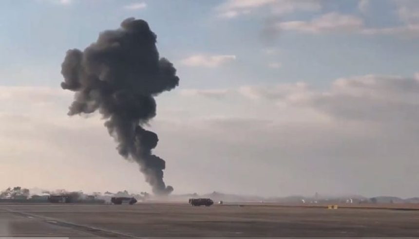 The smoke is seen billowing from the wreckage of the crashed plane. — Screengrab via X/rt_com