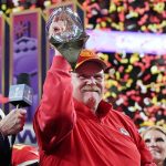 Andy Reid hoists trophy