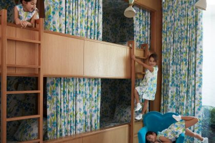 Image may contain Child Person Clothing Footwear Shoe Furniture Bed Bedroom Indoors Room and Bunk Bed