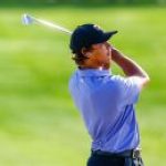 Tiger, son Charlie close strong, share PNC lead