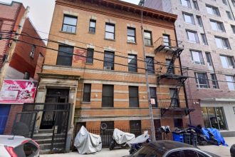 The apartment building in the Bronx where 22 suspected Tren de Aragua members were arrested on Dec. 5