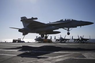 A US Navy F/A-18 Super Hornet fighter lands on the deck of the USS Ronald Reagan, a Nimitz-class nuclear-powered super carrier, during a joint naval drill between South Korea and the US, in the West Sea, South Korea, October 29, 2015. — Reuters