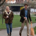 Image may contain Florence Pugh Andrew Garfield Person Walking Cup Clothing Footwear Shoe Accessories and Bag