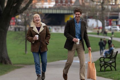 Image may contain Florence Pugh Andrew Garfield Person Walking Cup Clothing Footwear Shoe Accessories and Bag