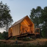 Exterior of Eastwind Hotel and Bar in the woods.