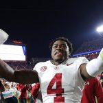 Jalen Milroe celebrates after beating Auburn