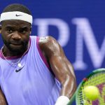 Frances Tiafoe plays shot