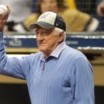 Bob Uecker holds ball