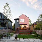 Rebuilding the rear addition gave Aleksandra a chance to play with its form, and make it contrast with the historic body of the Edwardian. Large glass doors lighten up the kitchen and connect it to the deck and backyard.