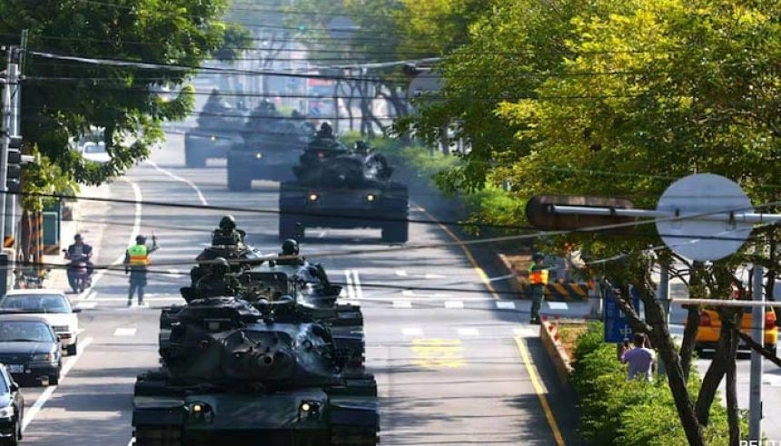 Soldiers drive M60 tanks on a street as part of a military drill in Taichung, Taiwan. — Reuters/File