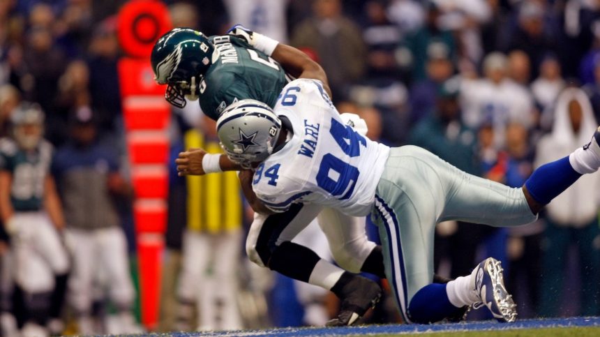 DeMarcus Ware of the Dallas Cowboys sacks Donovan McNabb (5) of the Philadelphia Eagles during the Eagles 10-6 win over the Cowboys at Texas Stadium in Irving, Texas.