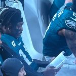 AJ Brown was seen reading as the Eagles took on the Packers