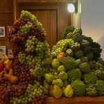 Centerpieces made out of fruits and vegetables at wedding, photographed and designed by Victoria Jane