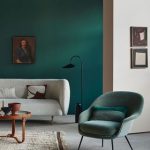 teal green living room with white sofa