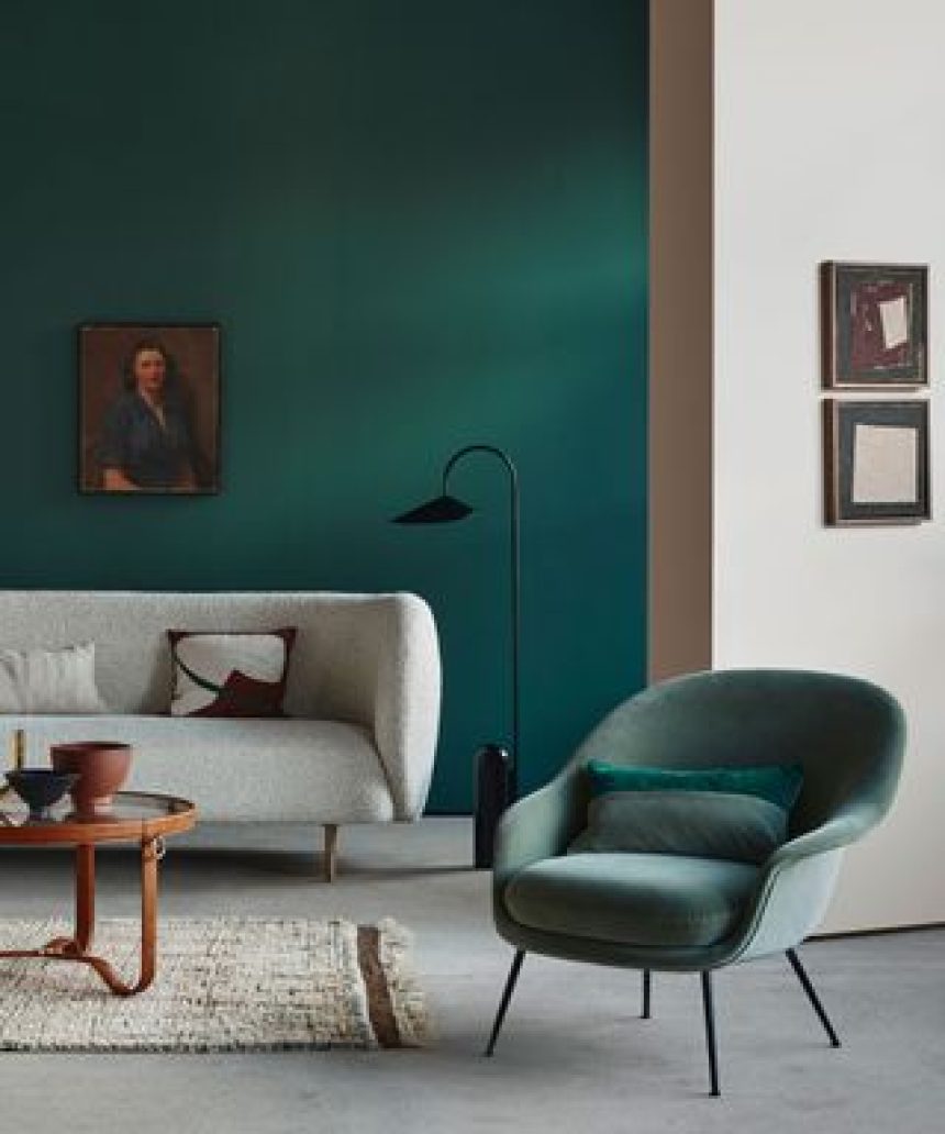 teal green living room with white sofa