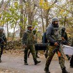 Indian security forces at war with Maoists seen walking in woods — AFP/File