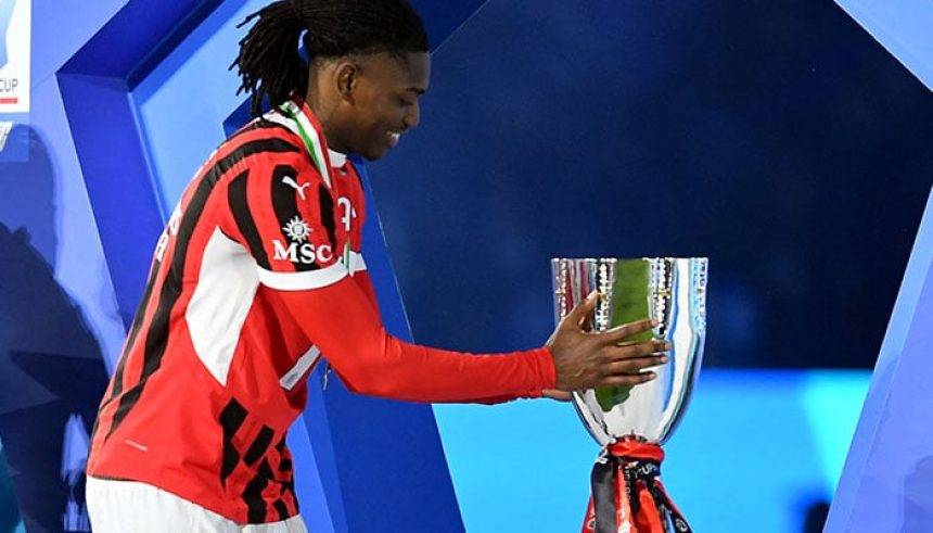 AC Milans Rafael Leao touches the cup after collecting his winners medal during the trophy presentation, after the Italian Super Cup final against Inter Milan at Al Awwal Park in Riyadh, Saudi Arabia on January 7, 2025. — Reuters