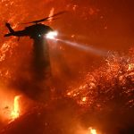 Helicopter over wildfires