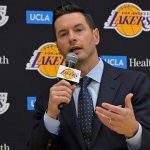 JJ Redick speaks on microphone