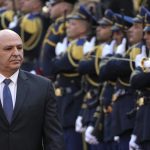 Newly-elected Lebanese President Joseph Aoun reviews the honor guard upon his arrival at the Lebanese Parliament to be sworn in as the new president in Beirut on Thursday, Jan. 9, 2025.