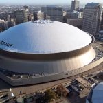 An aerial overall exterior general view of Caesars Superdome, Sunday, Dec. 15, 2024, in New Orleans. (AP Photo/Tyler Kaufman)