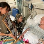 Martin in hospital with his mother, Lyndsey, and his girlfriend, Jess