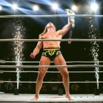 Matt Riddle celebrates