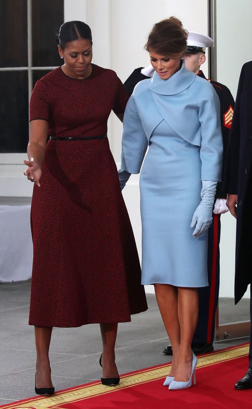 First lady Michelle Obama (L), greets Melania Trump after she and her husband president-elect Donald Trump arrived at the White House on January 20, 2017